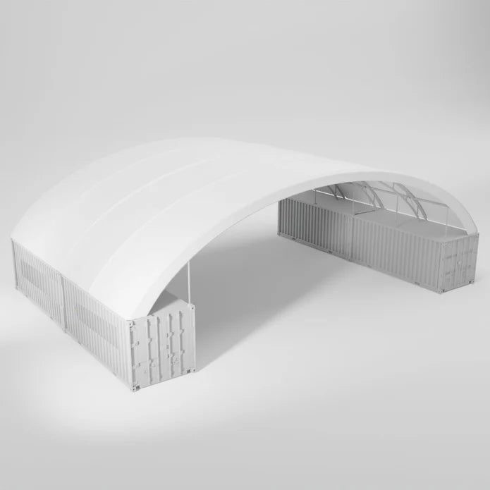 White arched tent supported by two shipping containers.