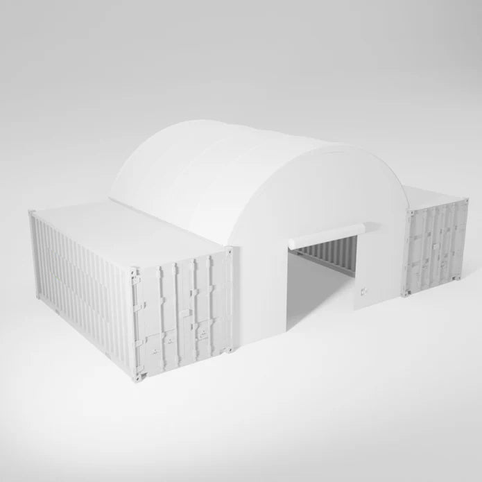 A white container shelter with metal shipping containers on either side of a white arched tent.