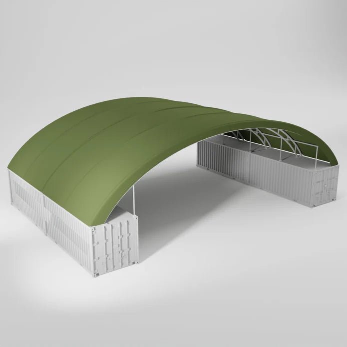 Shipping container shelter with a green fabric roof.